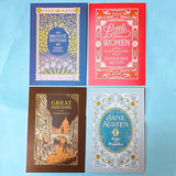 Four book cover  postcards of 'The Bronte Sisters', 'Little Women', 'Great Expectations', and 'Pride and Prejudice' on a light blue background