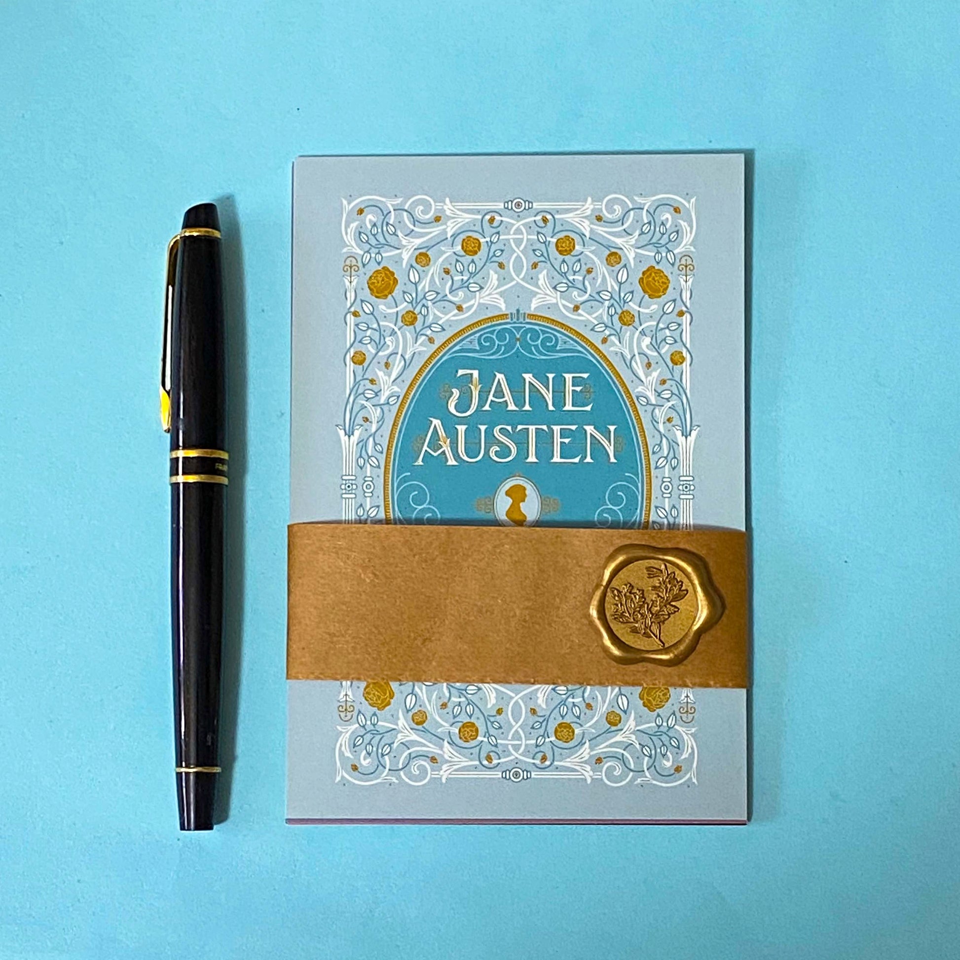 set of 4 vintage literary romantic postcards wrapped in a kraft belly band with a wax seal sticker