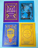 Four book cover postcards of classic literature featuring the count of monte cristo and the iliad and odyssey on a blue background