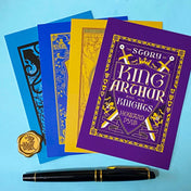 set of 4 vintage literary postcards featuring adventure book covers including king arthur and twenty thousand leagues under the sea.