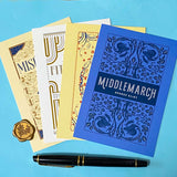 set of 4 vintage literary postcards featuring classic book covers in art deco style on a bleu background