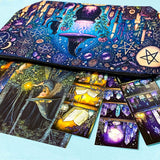 close up of a witch aesthetic canvas pouch with cauldron, candles and celestial symbols in purple and blue. 