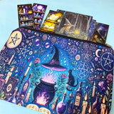 witchy canvas pouch with magical illustration filled with fantasy postcards and bookmarks on blue background