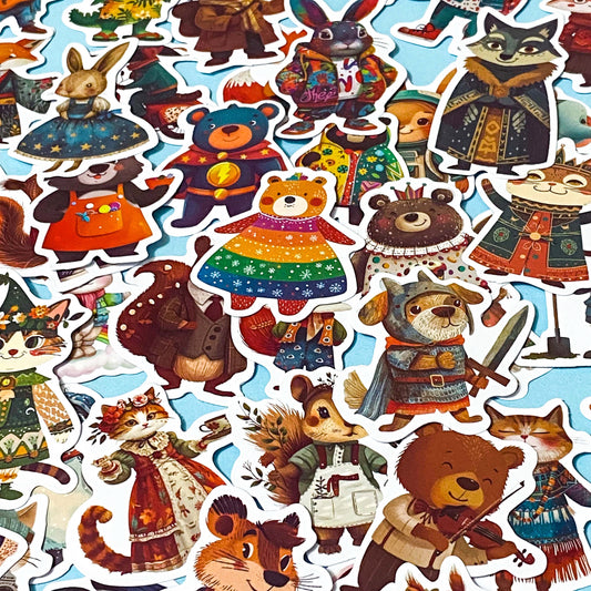 cute animal laptop stickers featuring woodland characters and colourful outfits on a blue background