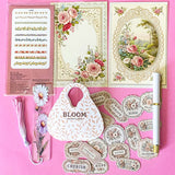 vintage floral letterbox gift set with large flower pouch, pearly white metal pen, daisy tassel acrylic bookmark, floral postcards and vintage decorative journaling stickers on pink background. UK cute gifts and stationery sets.