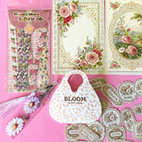 vintage floral letterbox gift set with large flower pouch, pearly white metal pen, daisy tassel acrylic bookmark, floral postcards and vintage decorative journaling stickers on pink background. UK cute gifts and stationery sets.