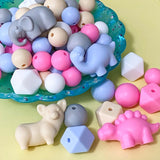 Dino dinosaur dinosaurs jumbo very large bead beads silicone Uk cute kawaii craft supplies elephant corgi dog unicorn blue pink white beige grey pretty big shop store jewellery making 