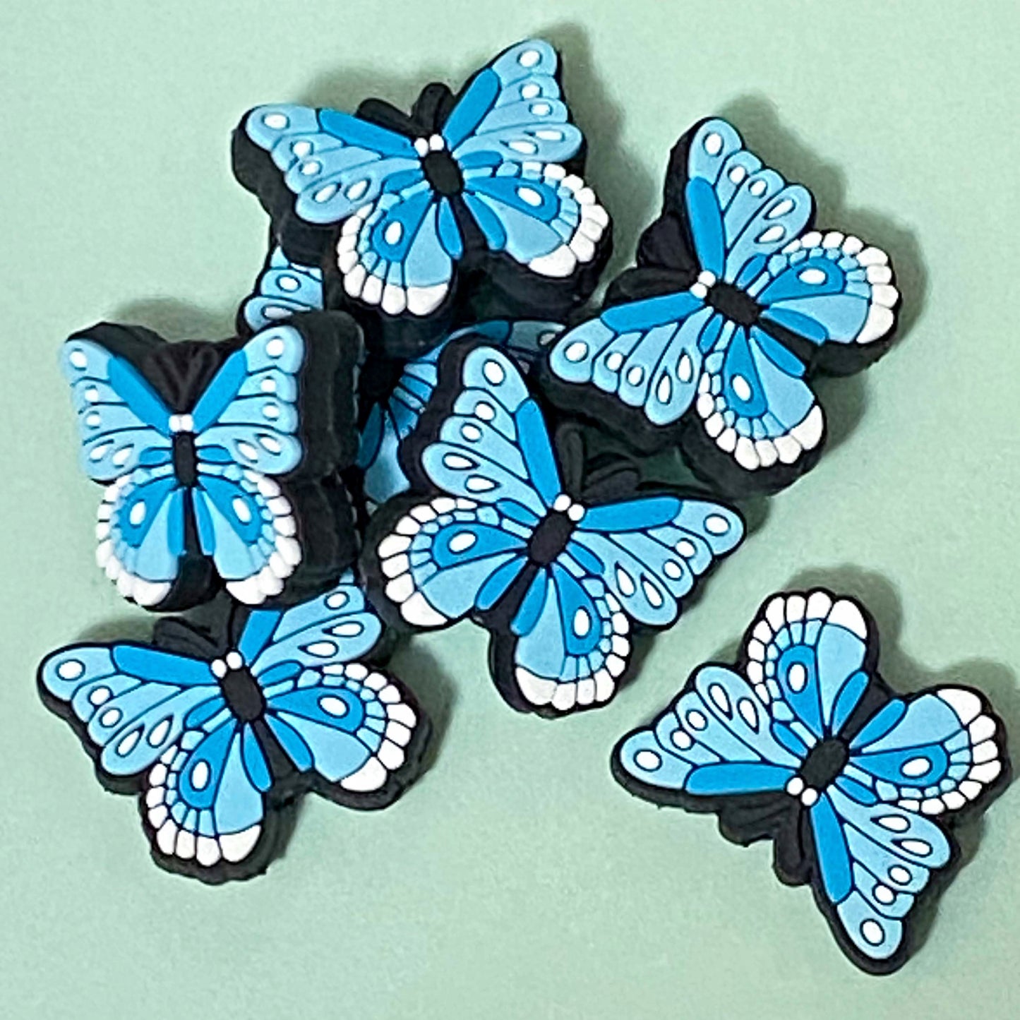 turquoise blue light pale butterfly butterflies bead beads jumbo large big 29mm 30mm 15mm 18mm wave pattern patterned swirl swirly pretty craft supplies uk cute kawaii shop store colourful silicone making beaded pen pens build your own jewellery keyring bookmark pvc