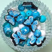 turquoise blue light pale butterfly butterflies bead beads jumbo large big 29mm 30mm 15mm 18mm wave pattern patterned swirl swirly pretty craft supplies uk cute kawaii shop store colourful silicone making beaded pen pens build your own jewellery keyring bookmark
