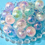 iridescent aurora glaze 16mm acrylic large beads with a pearly sheen and a marble centre