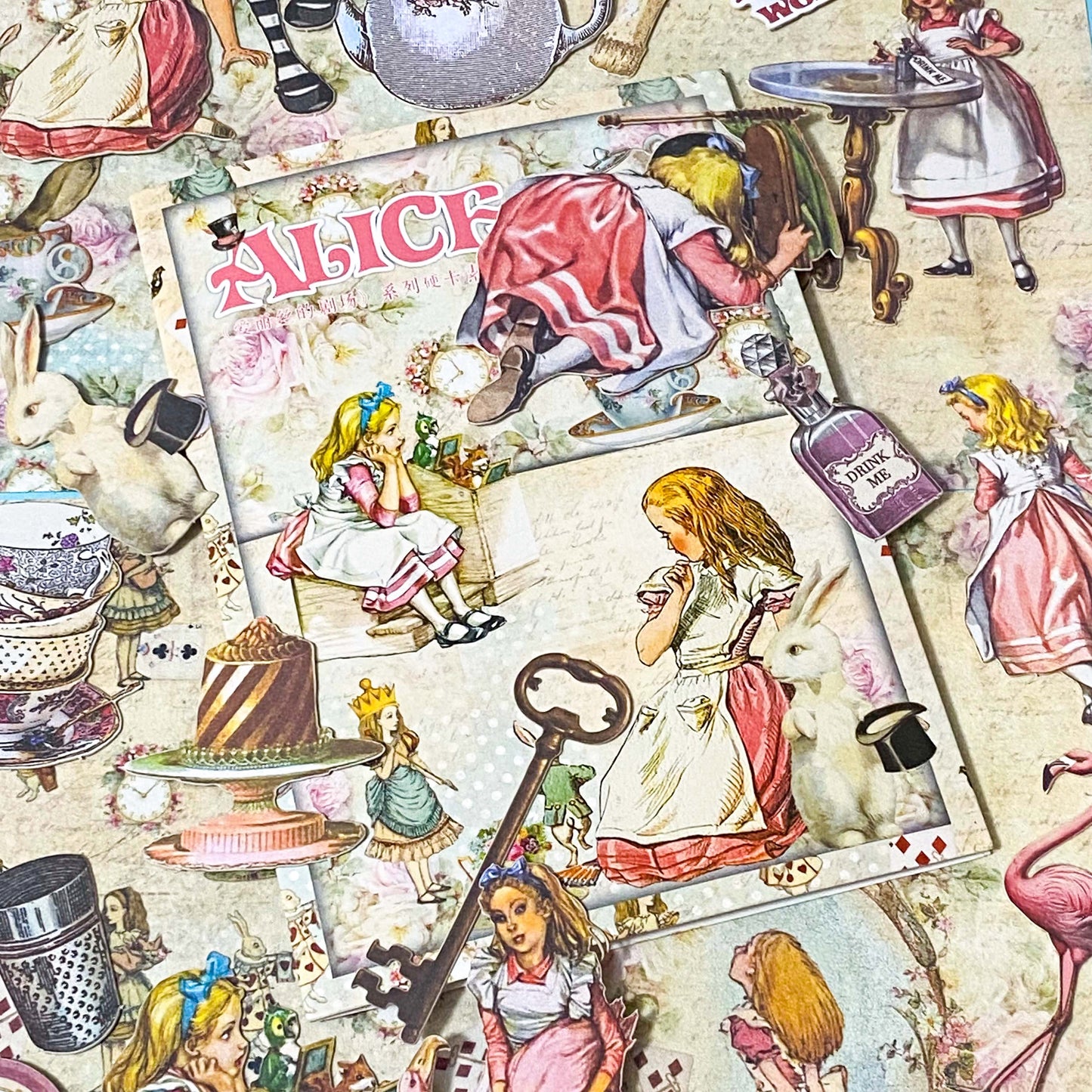 alice in wonderland ephemera pack with vintage paper sheets and die cut illustrations 