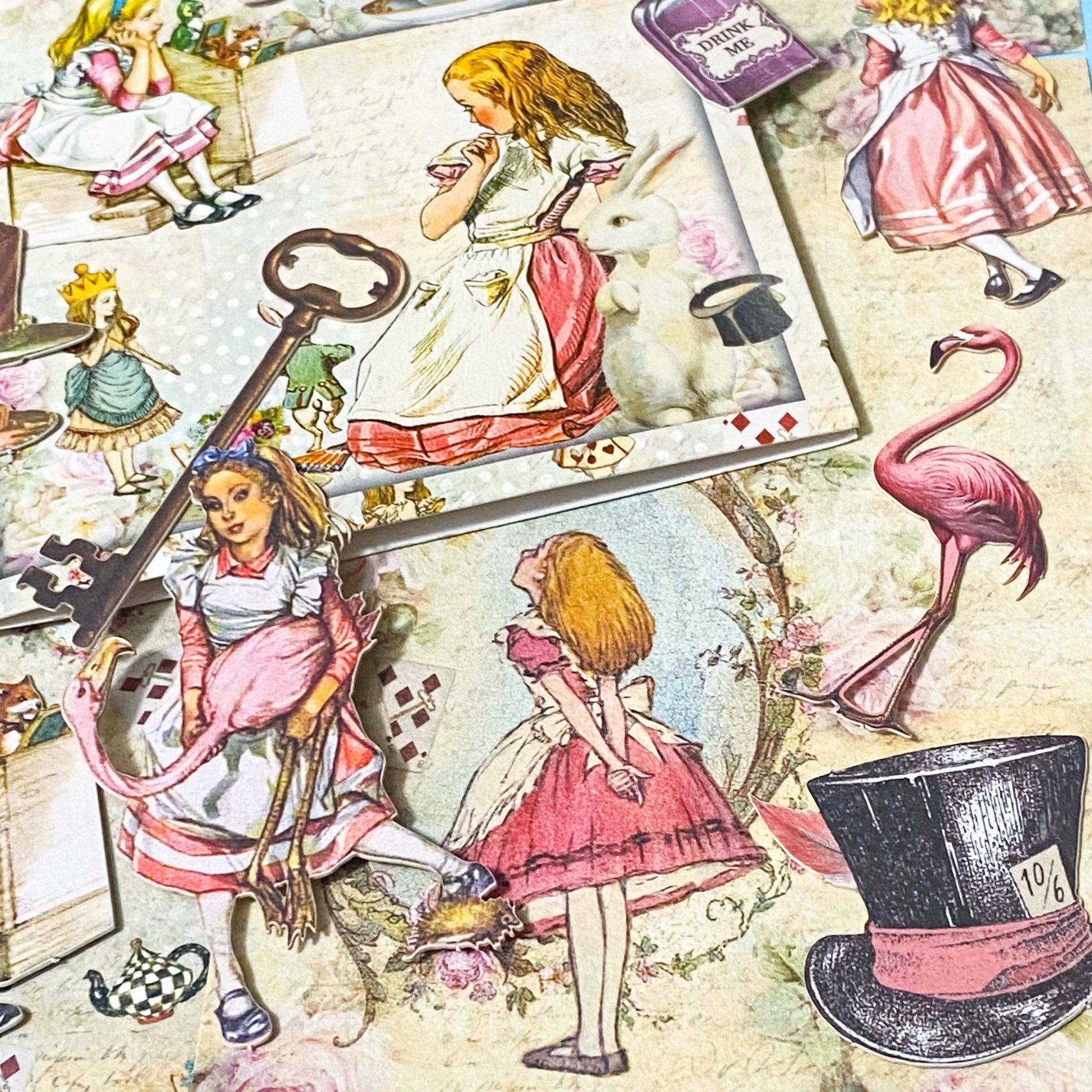 vintage alice in wonderland paper ephemera with floral backgrounds and character illustrations for journalling