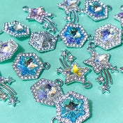 sparkly rhinestone rhinestones charm charms glitter glittery silver tone metal large big jumbo 20mm 31mm shooting star stars hexagon hexagonal glass faceted jewellery making craft supplies shop store clear blue turquoise pink purple lilac yellow 
