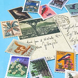 set of vintage style postage stamp stickers featuring birds, animals and plants on matte paper for journalling and scrapbooking