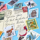 set of vintage style postage stamp stickers featuring birds, animals and plants on matte paper for journalling and scrapbooking