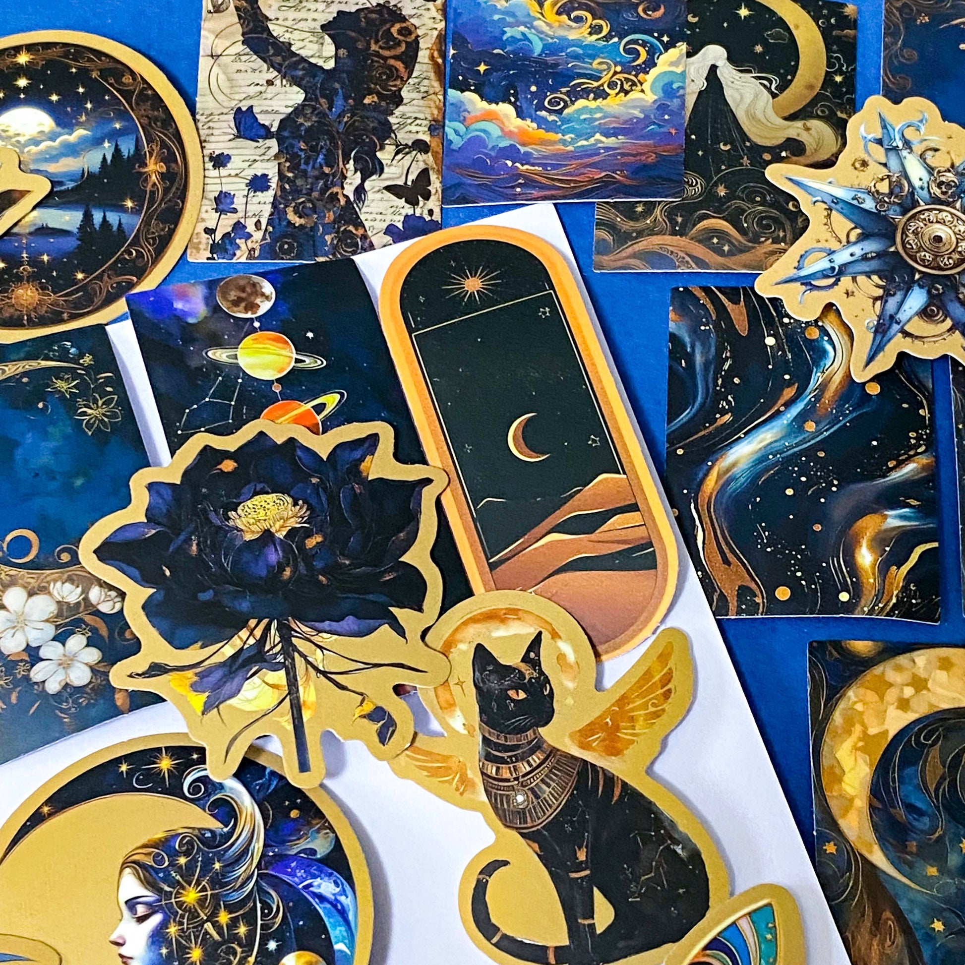 set of 50 dark celestial aesthetic stickers featuring stars, moons, planets, botanical illustrations and mystical designs in deep blue and gold tones