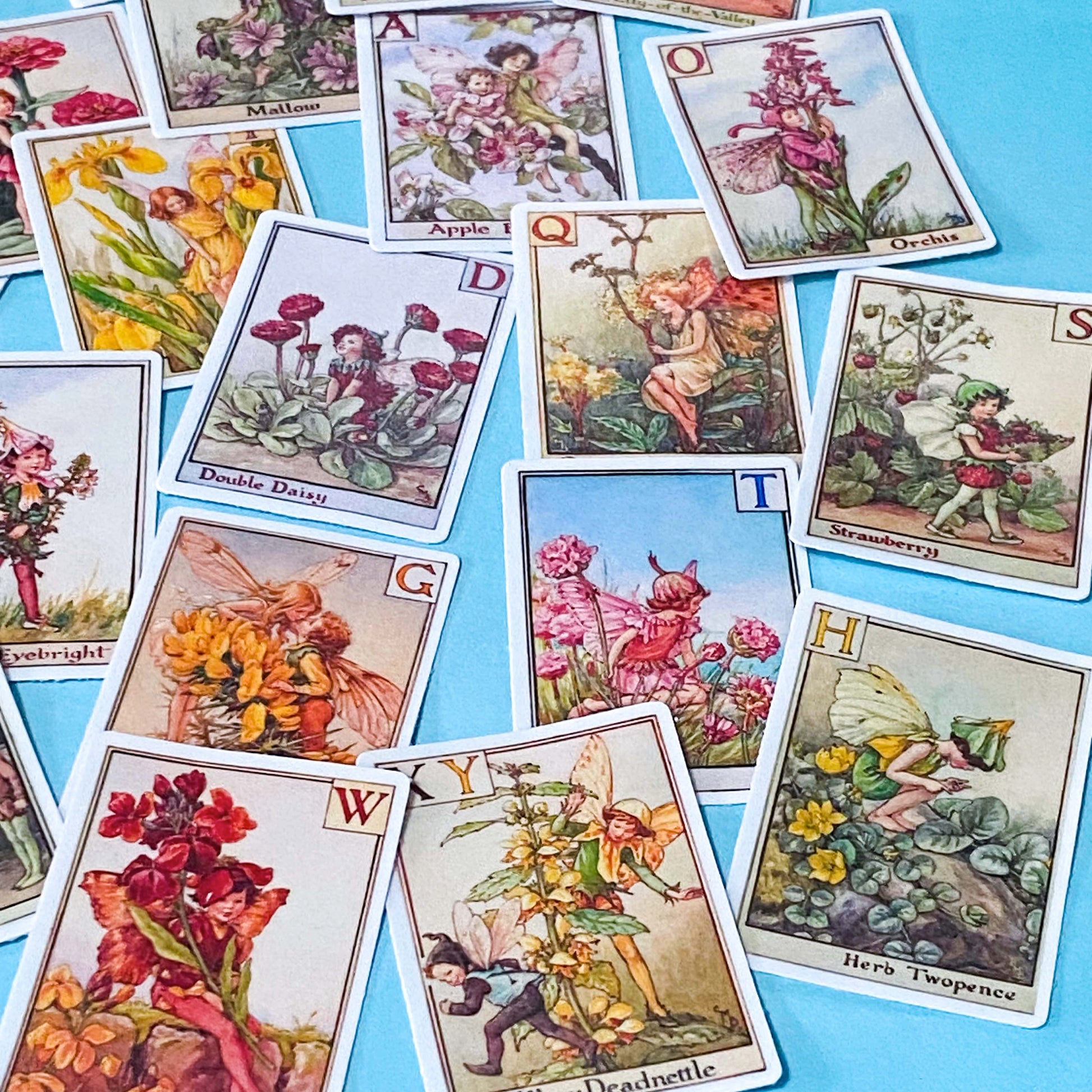 set of 24 vintage flower fairy alphabet stickers featuring botanical fairy illustrations with letters, satin finish and rounded corners