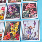 set of 16 large vintage style flower fairy satin stickers featuring botanical illustrations of fairies with flowers including lavender, tulip and poppy, with rounded corners