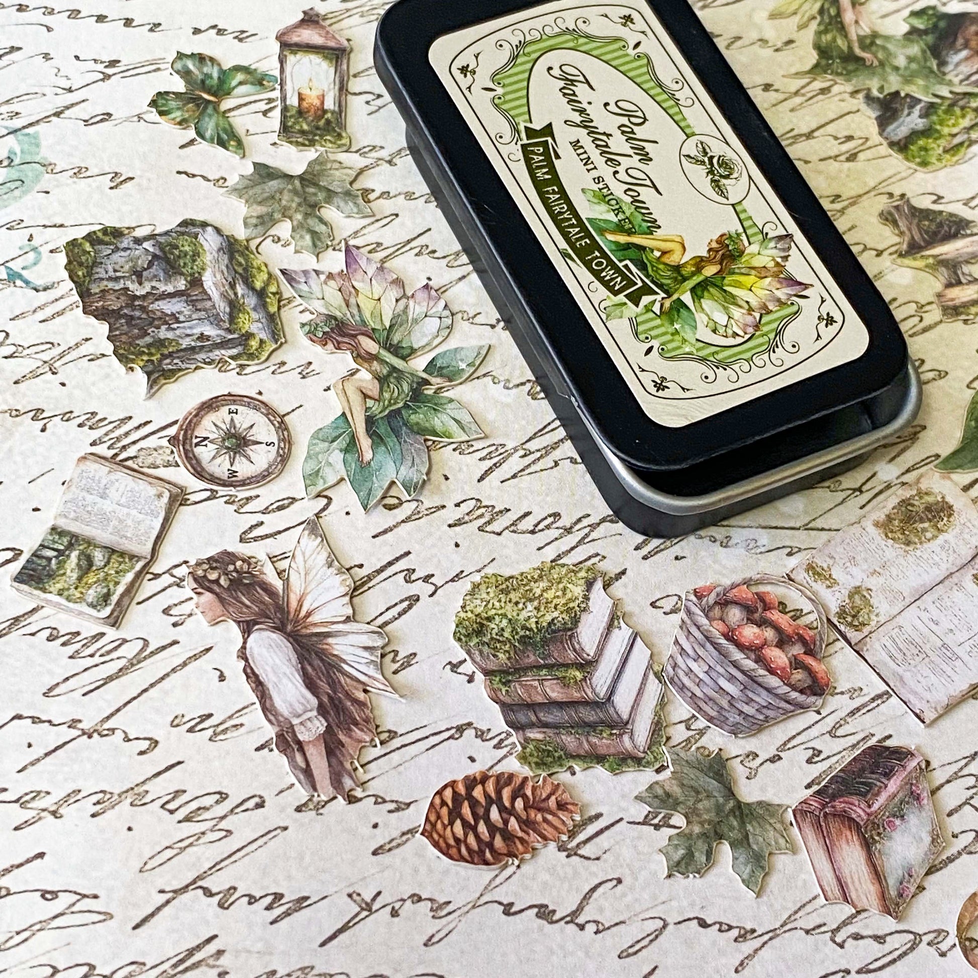 mini tin of 60 card stickers in an enchanted forest theme with mushrooms, berries, birds, books, butterflies, tree stumps and diamond rings