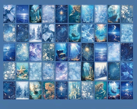 blue ocean themed scrapbook paper mini book with stars, sea and night sky illustrations