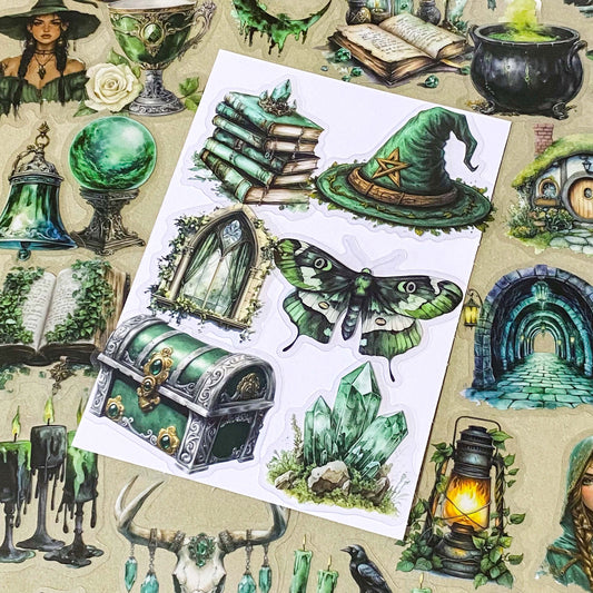 pack of 50 different emerald green magical stickers featuring witches, spell books, crystals, ravens, lanterns, enchanted moths, potion bottles and fantasy green clear PET illustrations. Uk stationery shop.