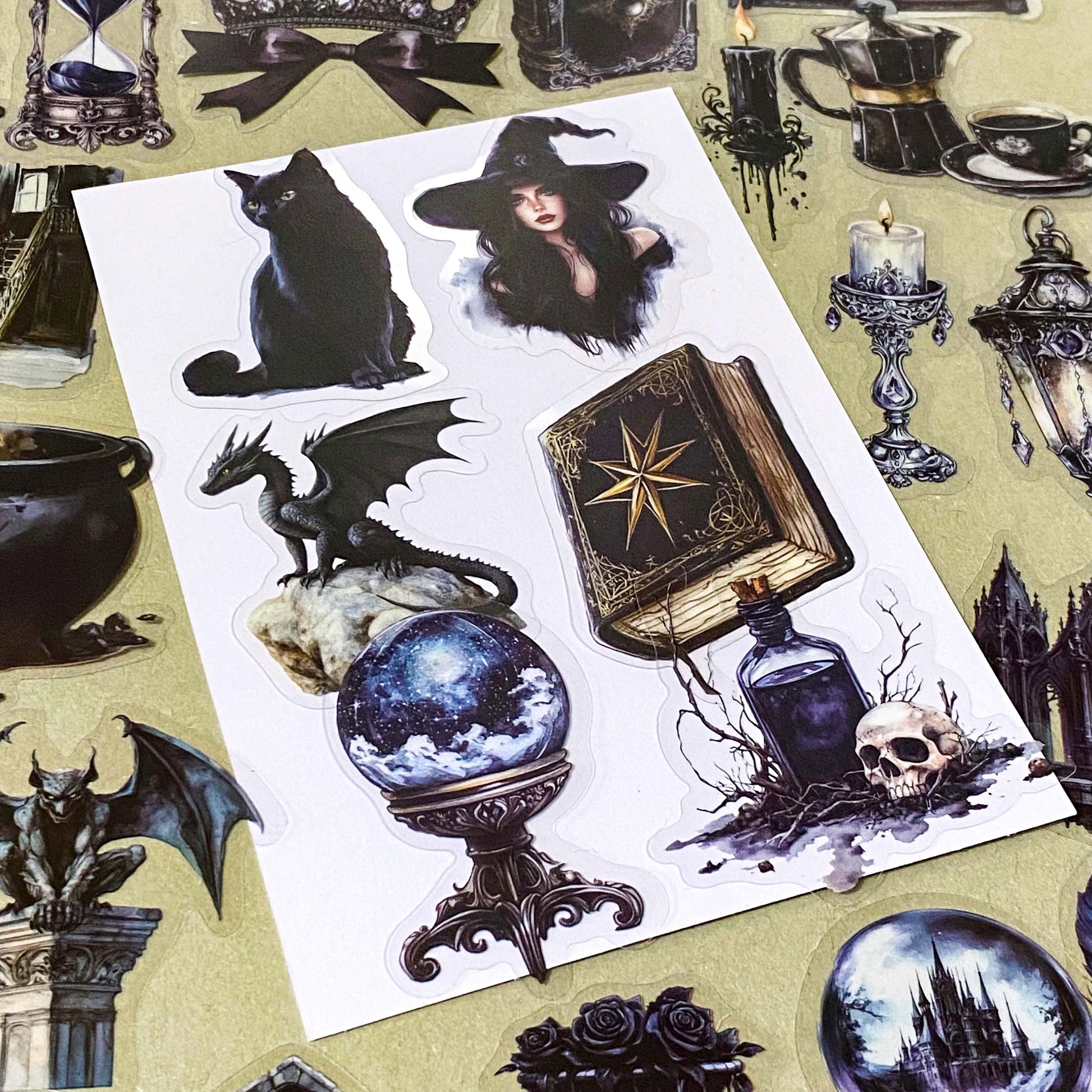 shadow gothic black and dark academia witchy gothic pet stickers pack of 50 with candles, ravens, black cats, hats, crystals, teapots, bats, griffins, potions, spell books. large 70mm clear plastic sticker pack.