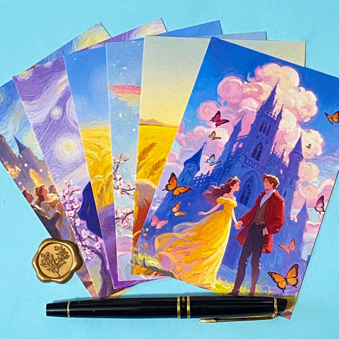 set of 6 romantic fantasy postcards featuring castle scenes, couples, golden fields and fairytale illustrations. angles with pen for scale. 