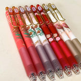 set of floral gel pens 0.5mm nib with vintage rose and botanical designs in red, pink and cream tones with gold clips