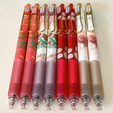 set of floral gel pens 0.5mm nib with vintage rose and botanical designs in red, pink and cream tones with gold clips