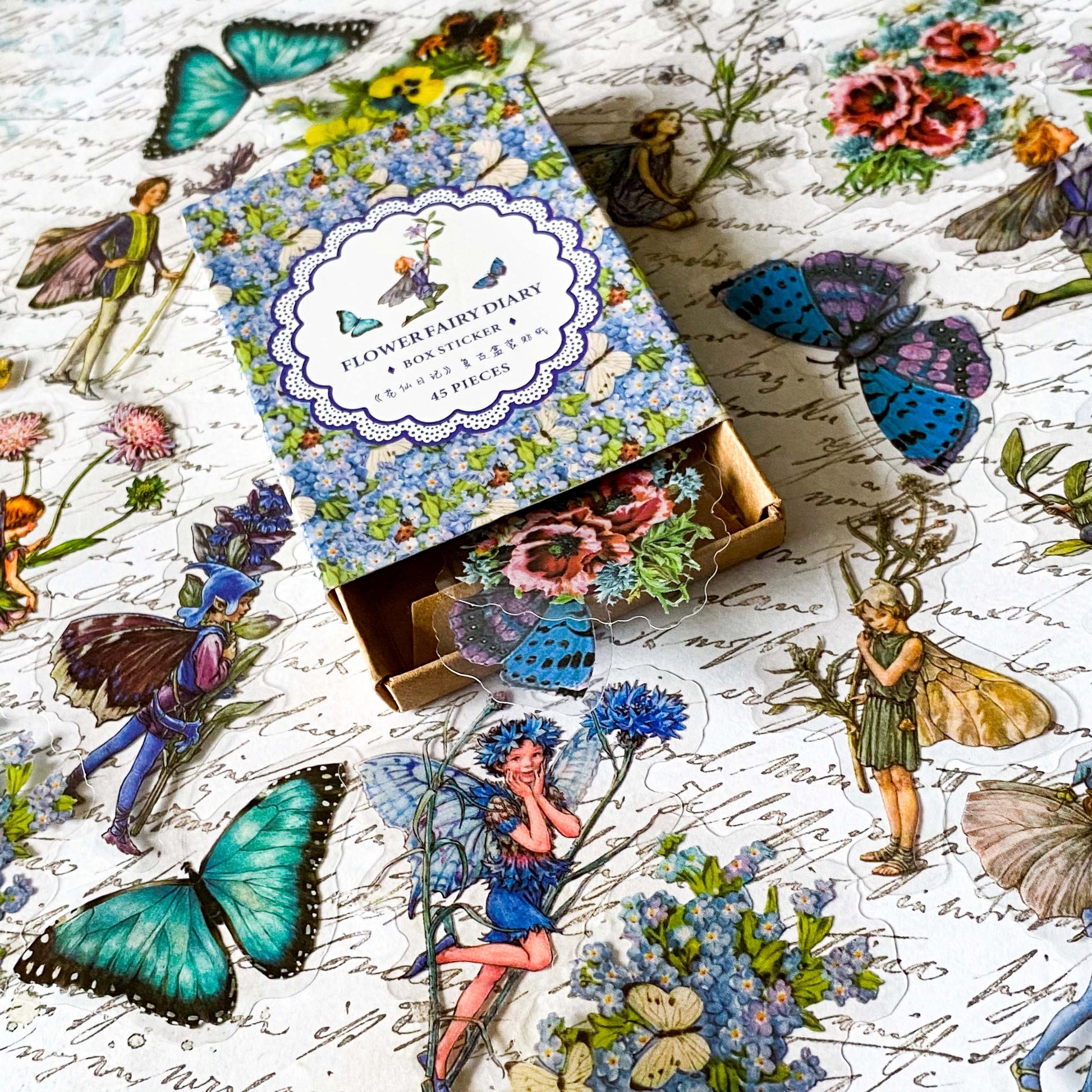 flower fairy clear sticker box with vintage botanical fairies transparent stickers set in blue box, blue violet and turquoise green flowers and butterflies