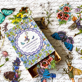 flower fairy clear sticker box with vintage botanical fairies transparent stickers set in blue box, blue violet and turquoise green flowers and butterflies