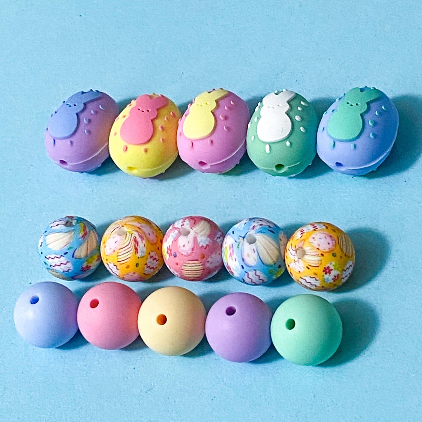 silicone spring shaped beads in easter bunny on an egg shape and patterned rounds