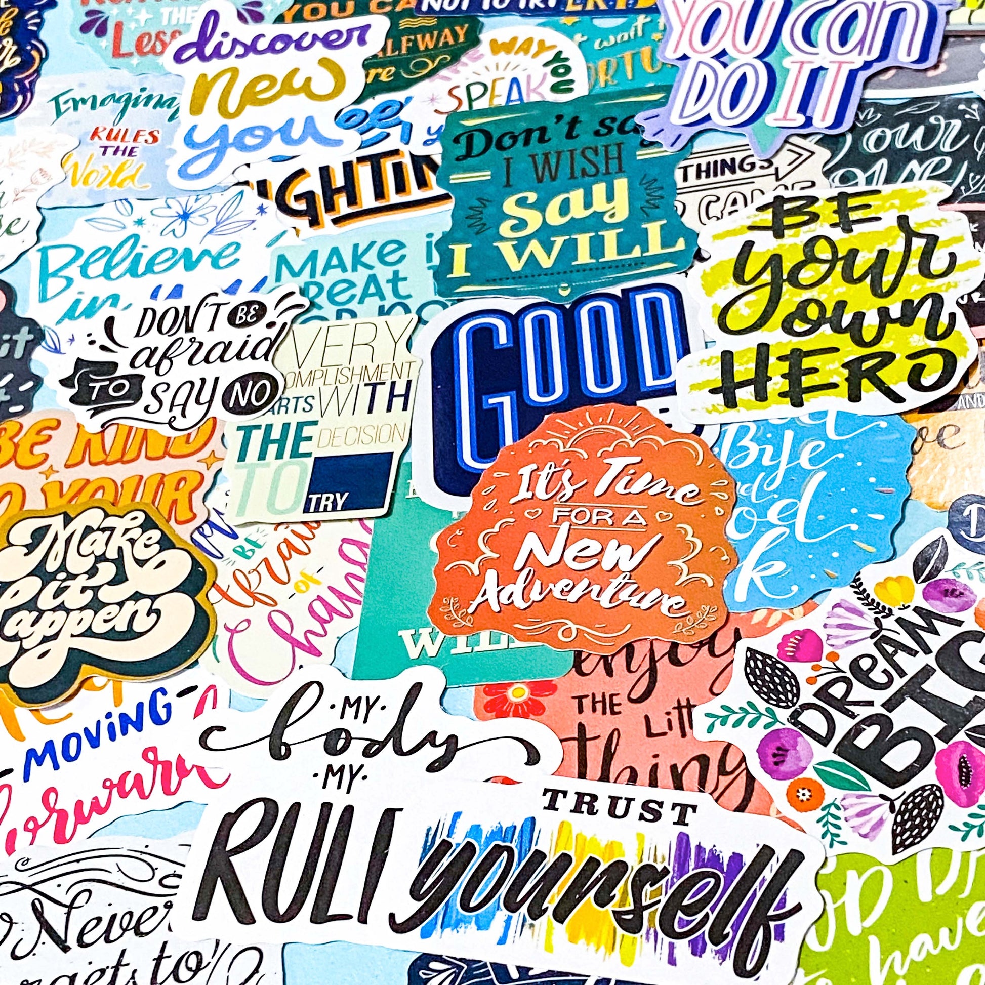 set of 100 colourful motivational affirmation stickers with positive quotes, glossy finish for laptops journals and scrapbooks