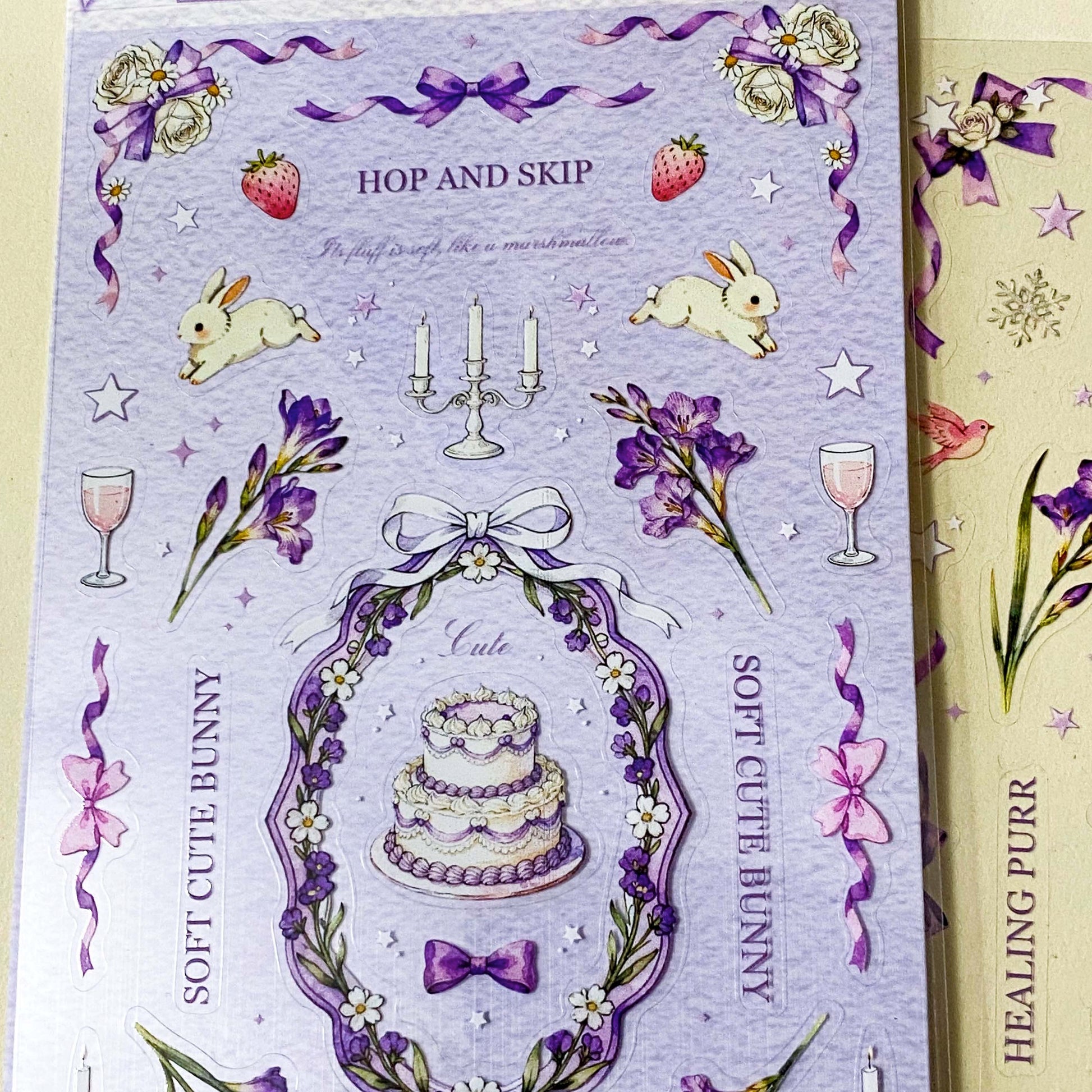 set of 2 purple floral clear sticker sheets with bunnies kittens bows and vintage style decorative elements