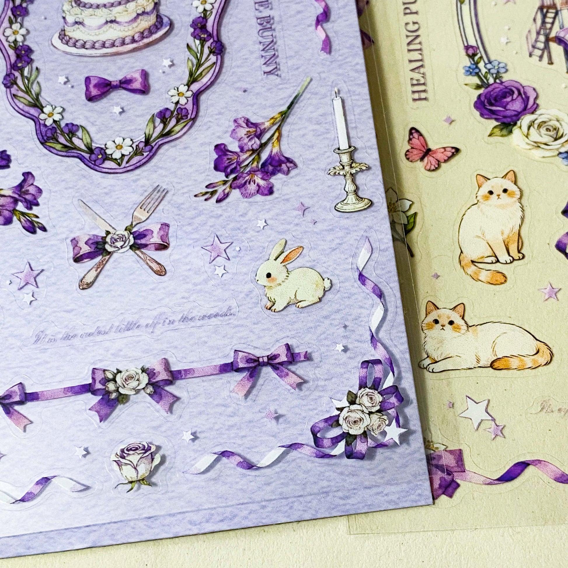 set of 2 purple floral clear sticker sheets with bunnies kittens bows and vintage style decorative elements