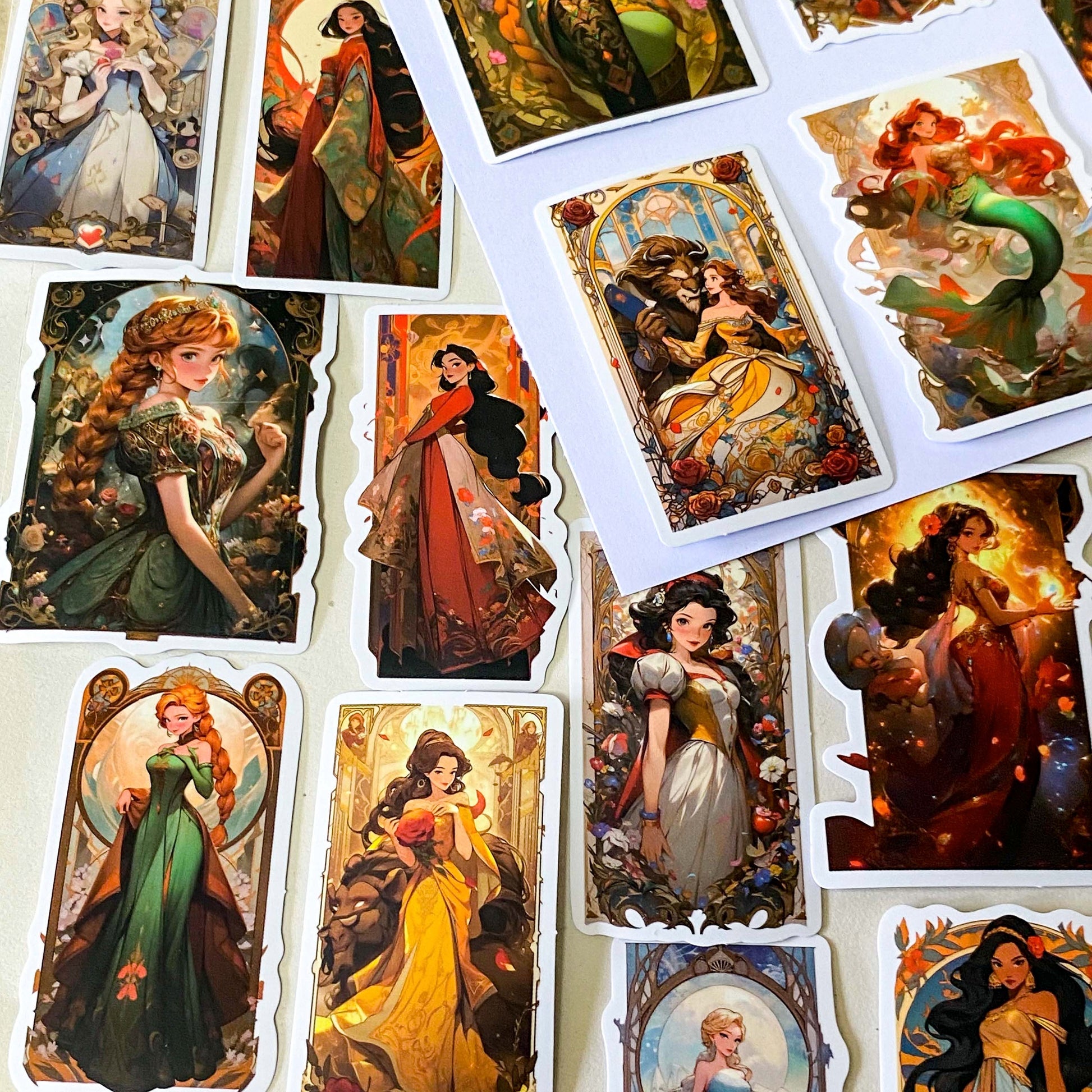 pack of 50 large rectangular matte paper stickers featuring beautifully illustrated fantasy heroines, princesses and magical storybook characters in rich colourful artwork. uk stationery shop.