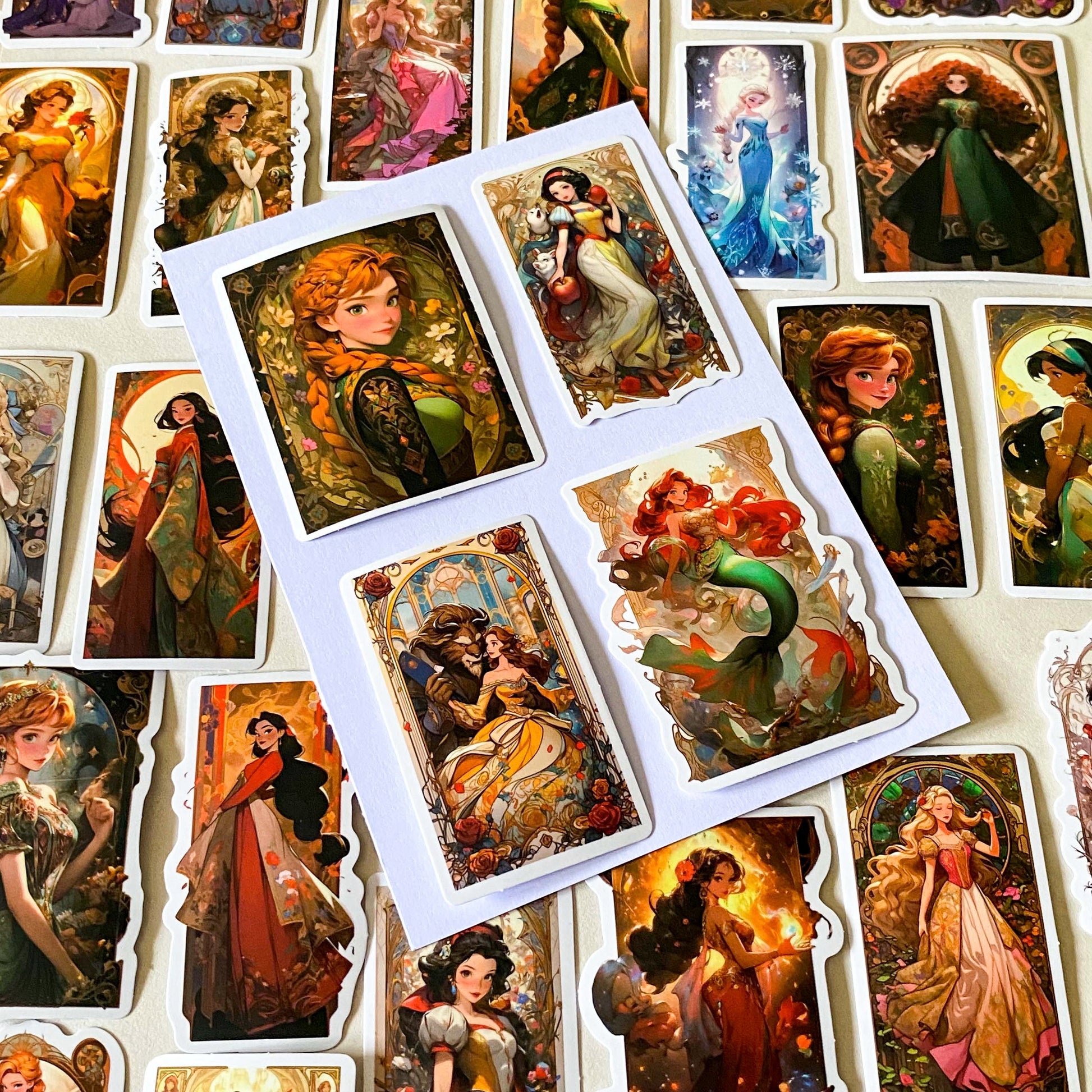 pack of 50 large rectangular matte paper stickers featuring beautifully illustrated fantasy heroines, princesses and magical storybook characters in rich colourful artwork. uk stationery shop.
