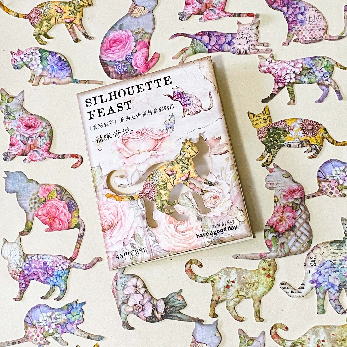 pack of 45 paper stickers featuring elegant cat silhouettes filled with vintage roes, hydrangeas, botanical flowers and antique inspired illustrations. uk stationery shop for journaling and scrapbooking.
