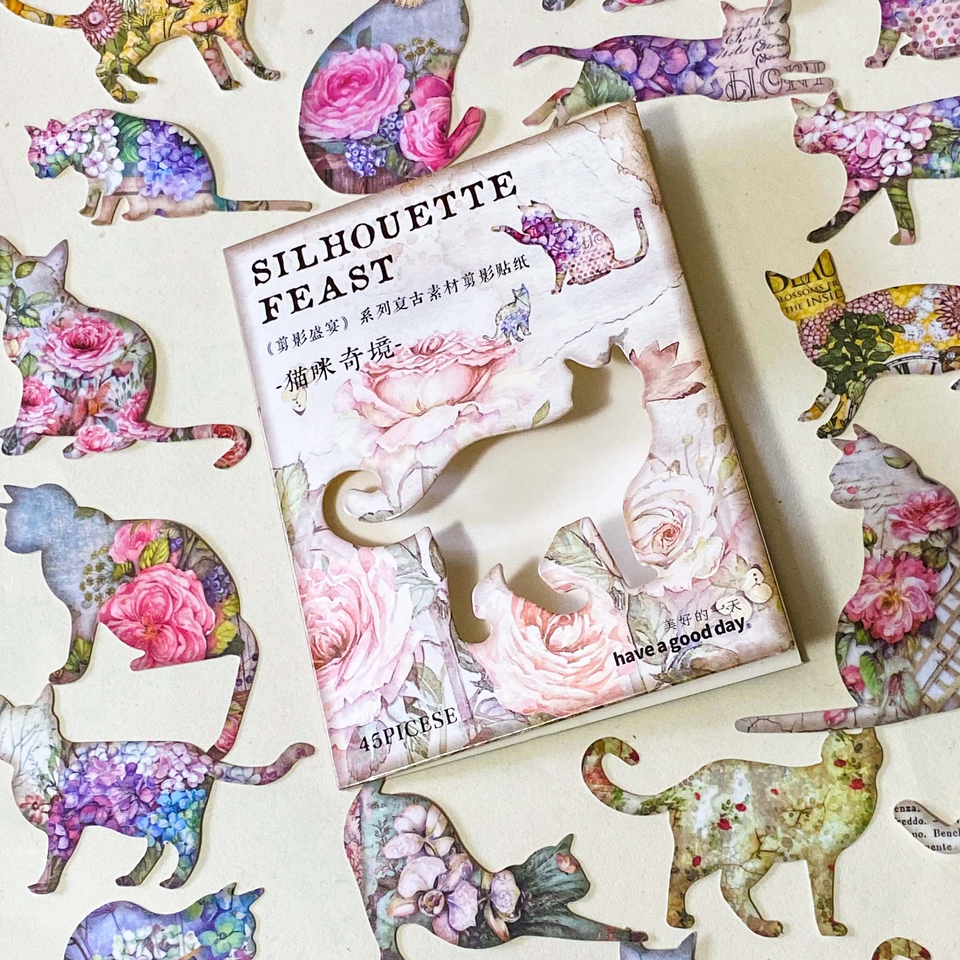 pack of 45 paper stickers featuring elegant cat silhouettes filled with vintage roes, hydrangeas, botanical flowers and antique inspired illustrations. uk stationery shop for journaling and scrapbooking.