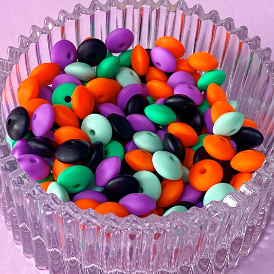 halloween spooky bead beads silicone spacer spacers bean beans abacus flat rondelle uk cute kawaii craft supplies shop store purple turquoise green mint black orange mix blend 12mm by 7mm beaded pen pens make your own jewellery