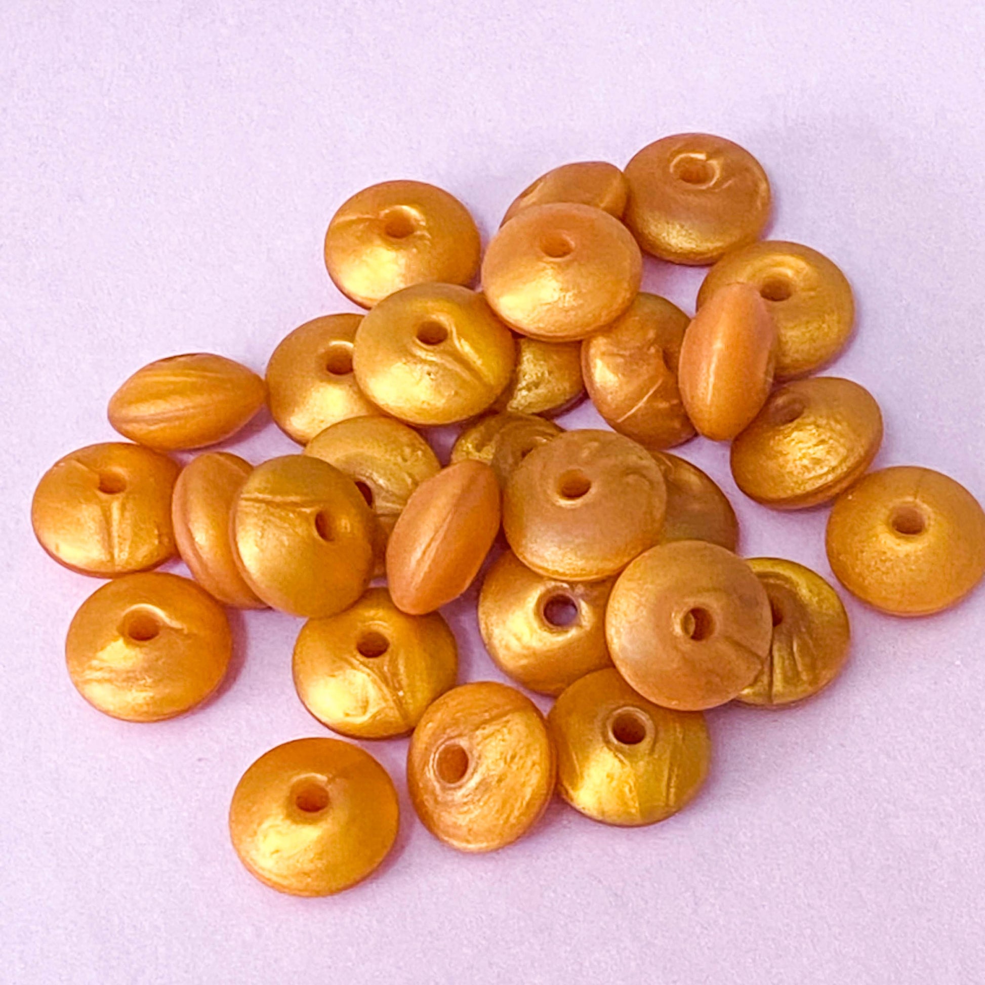 silicone spacer spacers bead beads abacus disc disk flat flattened 12mm 7mm thin bead beads uk cute kawaii craft supplies shop store pink white blue grey gold golden pretty jewellery supplies making beaded pen pens gift gifts pearl pearly pearlescent metallic 