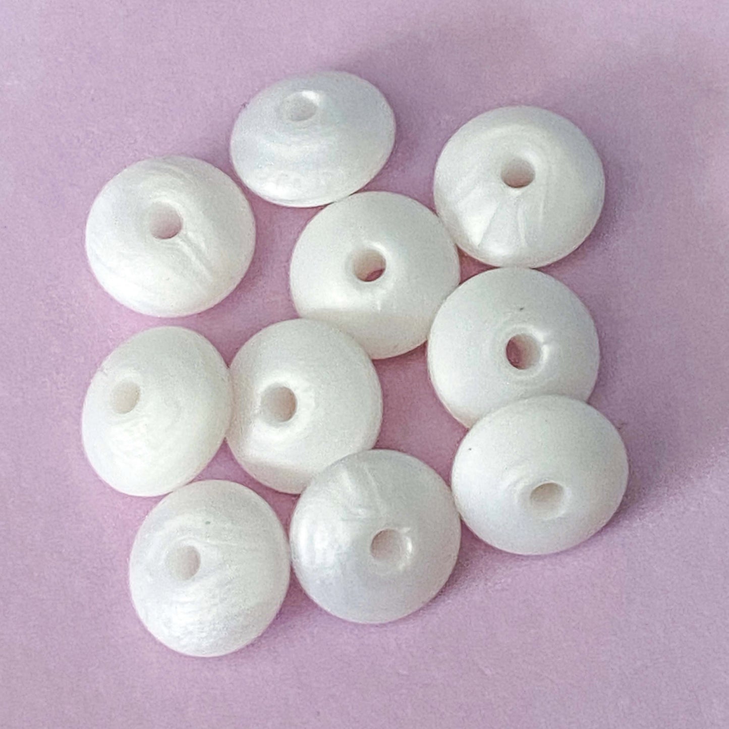 silicone spacer spacers bead beads abacus disc disk flat flattened 12mm 7mm thin bead beads uk cute kawaii craft supplies shop store pink white blue grey gold golden pretty jewellery supplies making beaded pen pens gift gifts pearl pearly pearlescent metallic 