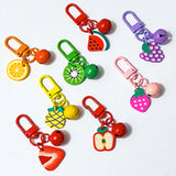 metal and enamel key ring rings clip clips bag charm charms jingle bell bells fruit fruits orange melon watermelon kiwi strawberry strawberries grape grapes purple pink red yellow pineapple green gift gifts uk stocking filler present cute kawaii