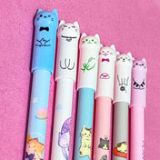 cartoon cat slimline erasable fineline pens on a pink background