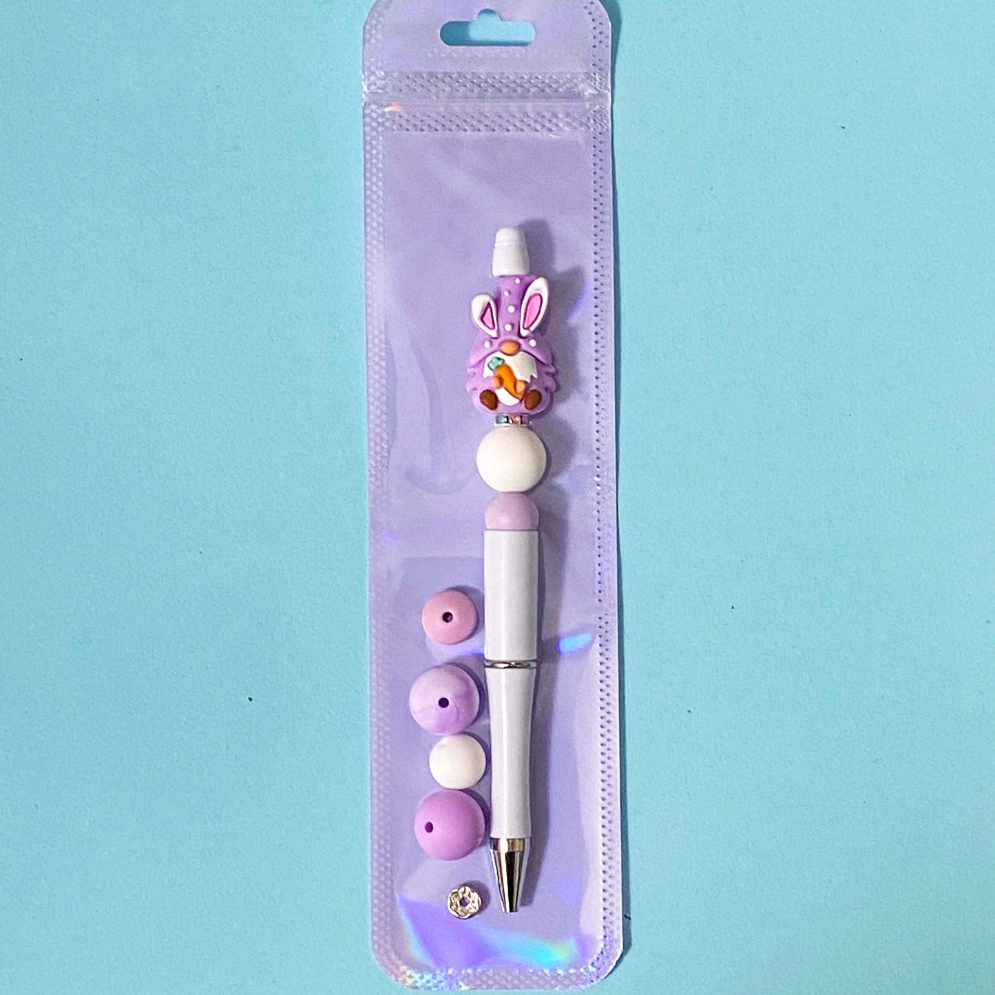 lilac bunny gnome Spring silicone bead diy beaded pen kit on a blue background
