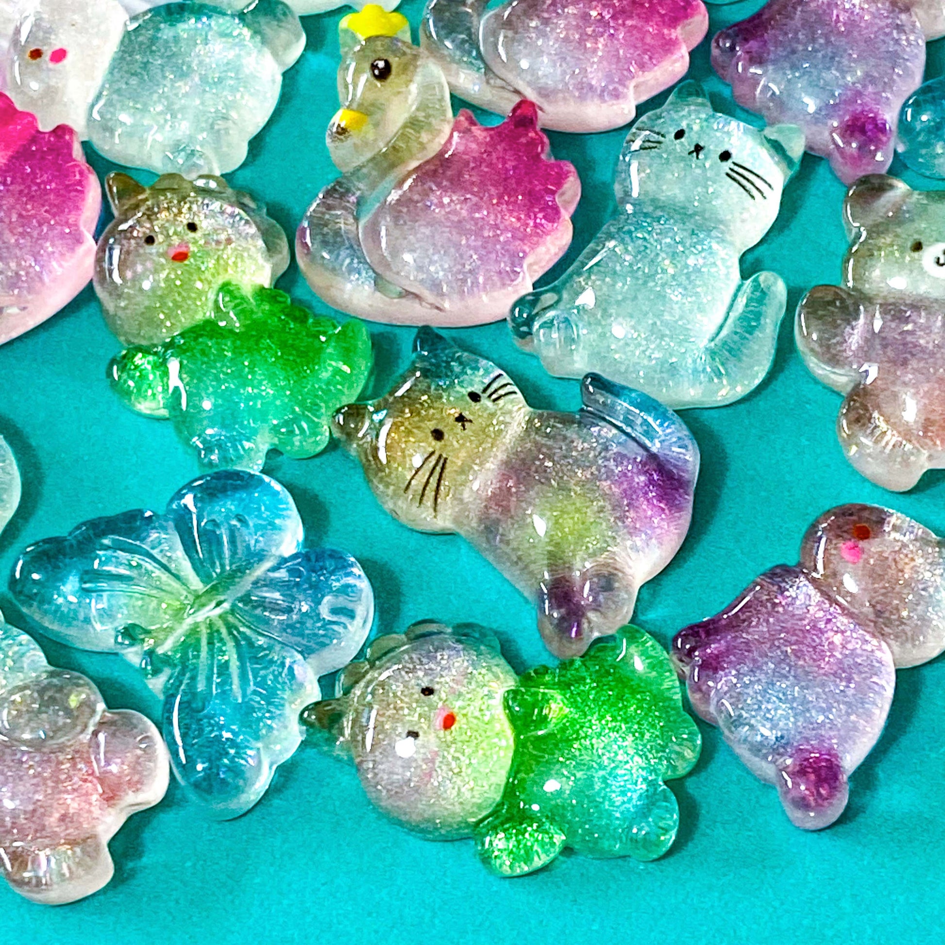 Cute kawaii glitter resin resins fb fbs flatbacks flat back Uk craft supplies shop store bunny rabbit rabbits rainbow glittery chunky cat cats kitty bow bows blue butterfly butterflies Swan Dino dinosaur dinosaurs 