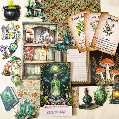 forest green witch journal kit with botanical herb cards, green potion oracle card, woodland scrapbook papers and witchy stickers and die cuts