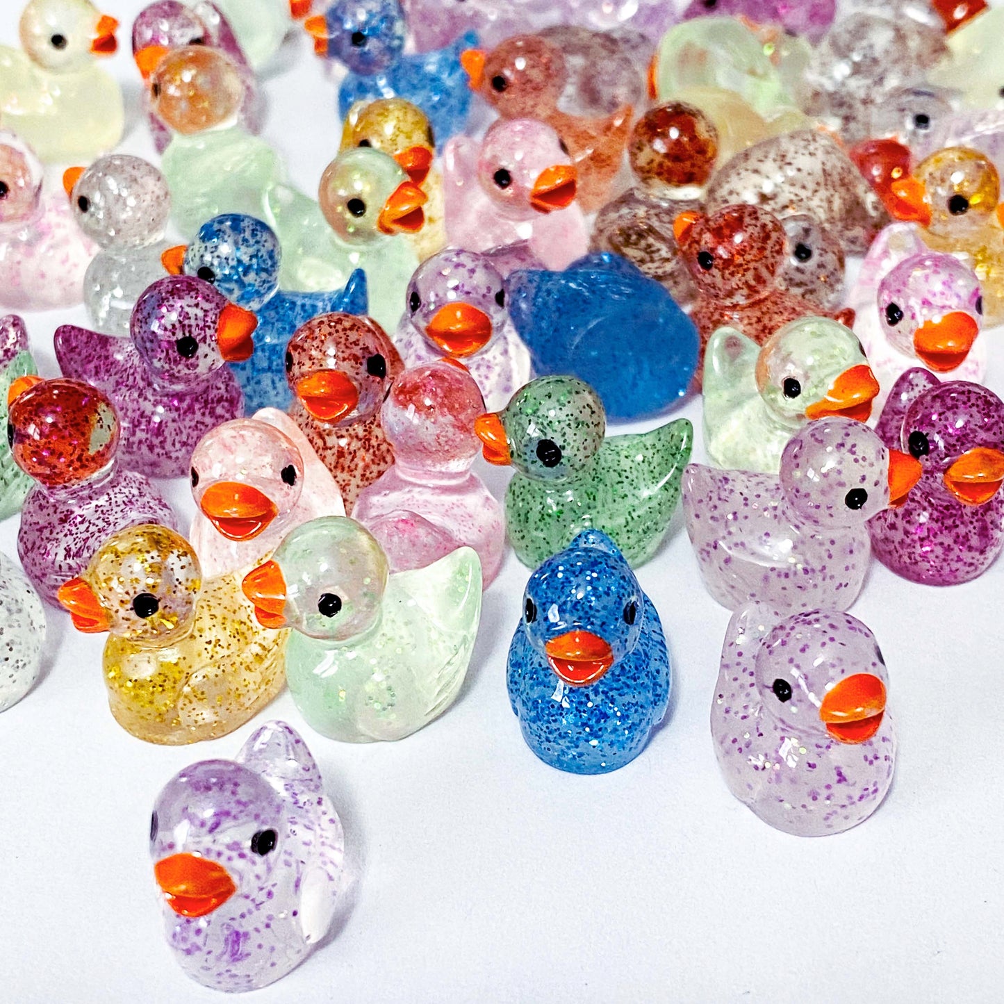 sparkly resin glitter glitters 3d duck ducks duckling ducklings flatback fb fbs flat back backs uk cute kawaii craft supplies shop miniature colourful clear pink lilac blue green yellow gold purple brown