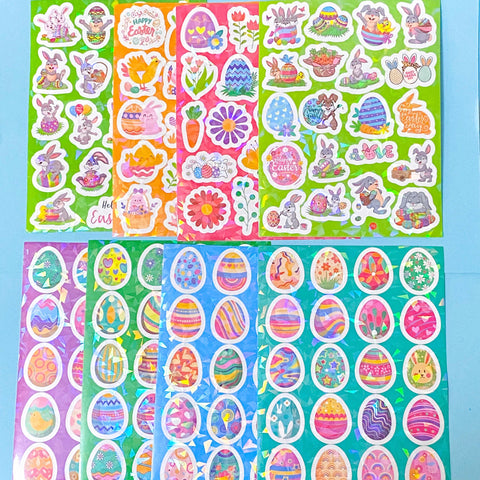 Collection of colorful Easter-themed stickers on a blue background with holo foil glitter highlights