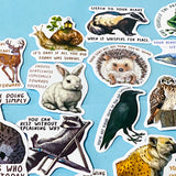set of 50 animal positive quote stickers with affirmations featuring illustrated wildlife including badgers, hedgehogs, deer, snails and birds on a soft blue background